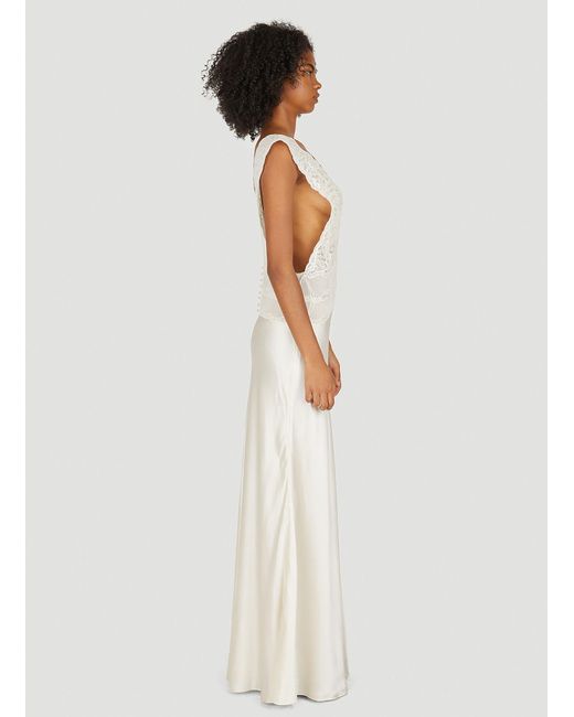 https://cdna.lystit.com/520/650/n/photos/lncc/9405c1f5/saint-laurent-White-Plunging-Lace-Dress.jpeg