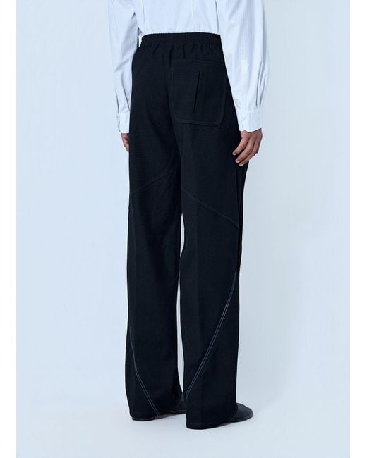 Kiko Kostadinov Blue High-Waisted Pleated Trousers for men