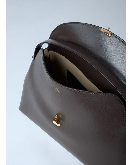 Totême Black T-Lock Leather Top-Handle Bag