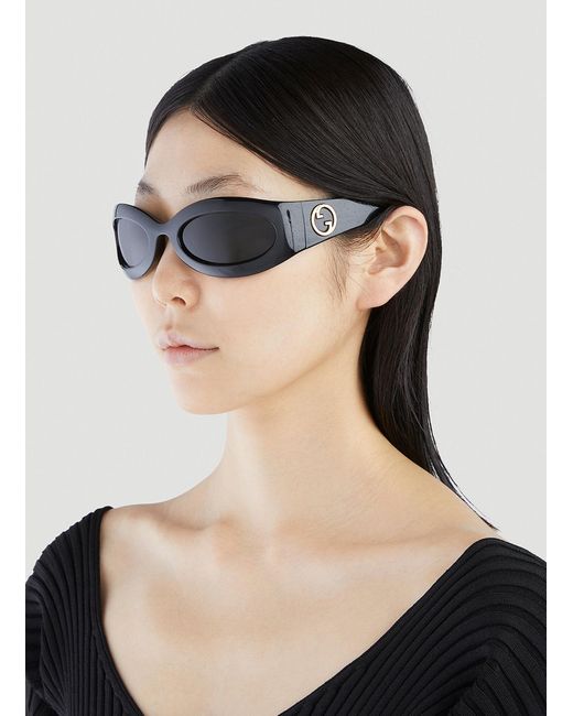 Gucci GG1247S Wrap Around Sunglasses in Black | Lyst