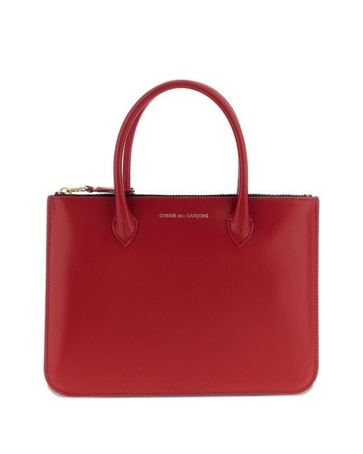 Comme des Garçons Red Handles