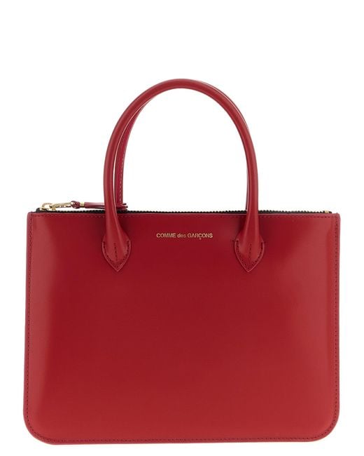 Comme des Garçons Red 'Handles