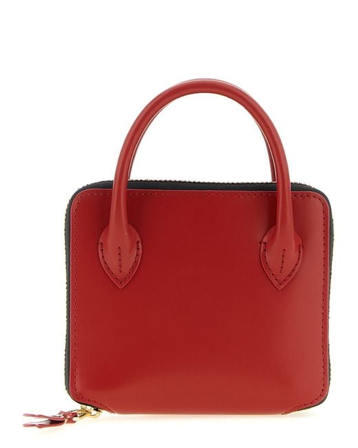 Comme des Garçons Red 'Handles