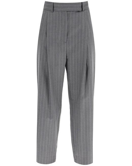 Totême Toteme Deep Pleat Pinstripe Wool Trousers in Gray | Lyst