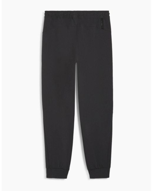 PUMA Black Zipped Pocket Solid Patterned Joggers for men