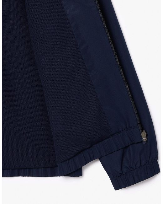 Lacoste Blue Zipped Hooded Tracksuit Jacket for men