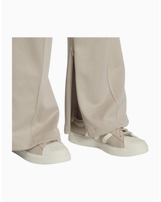 Adidas White Solid Patterned Track Pants for men