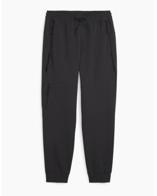 PUMA Black Zipped Pocket Solid Patterned Joggers for men