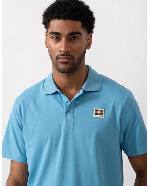 Aquascutum Blue Stretch Piquet Badge Polo Shirt for men