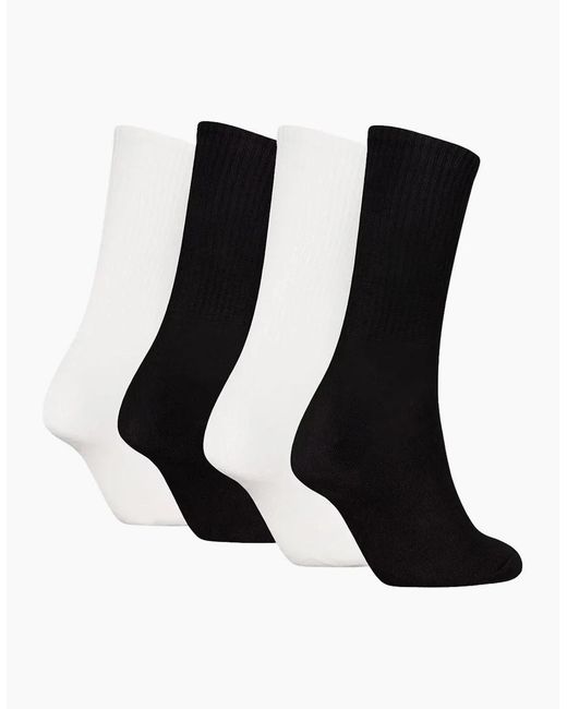 Calvin Klein Black 4-Pack Ck Jeans Logo Sports Socks Gift Tin