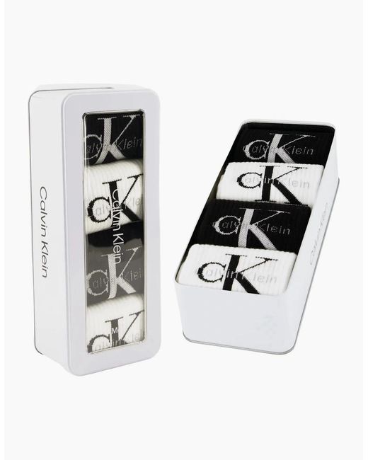 Calvin Klein Black 4-Pack Ck Jeans Logo Sports Socks Gift Tin for men