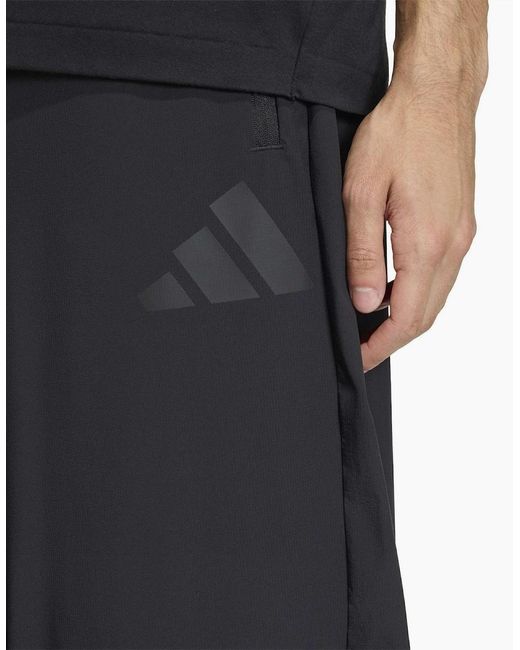 Adidas Black Z.N.E. Solid Patterned Wide Track Pants for men