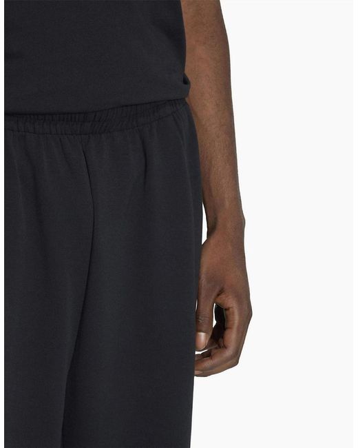 Adidas Black Solid Patterned Wide Fit Sweatpants for men