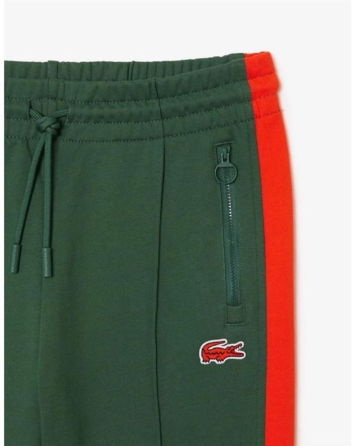 Lacoste Green Vertical Stripe Track Pants With Zipped Pockets