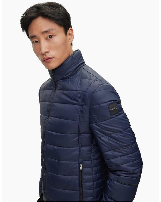 Boss Blue Solid Patterned Puffer Jacket for men