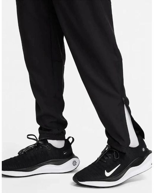 Nike Black Challenger Dri-Fit Woven Running Trousers for men