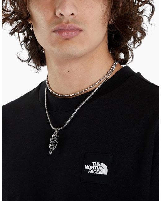 The North Face Black T Shirts Nse Patch Logo Crew Neck Short Sleeve Cotton Tee for men