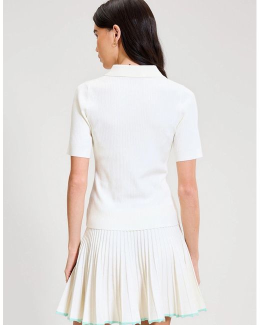 Ellesse White The Umpire Polo