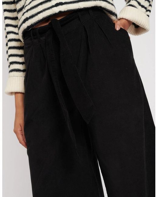 Nobody's Child White Solid Wide Leg Trousers