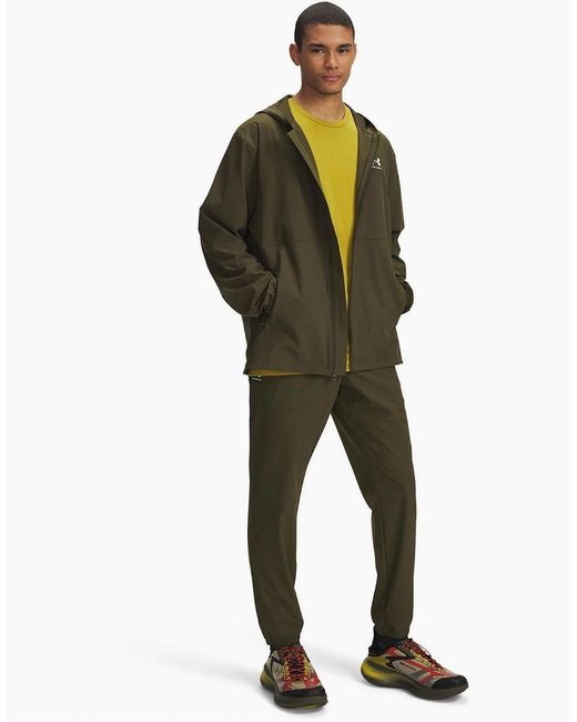 Under Armour Green Vibe Solid Patterned Tapered Joggers for men