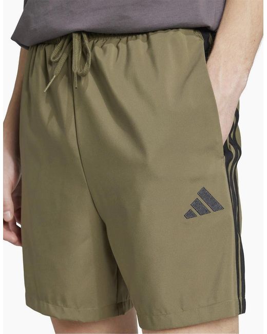 Adidas Green Essentials 3 Stripes Shorts for men