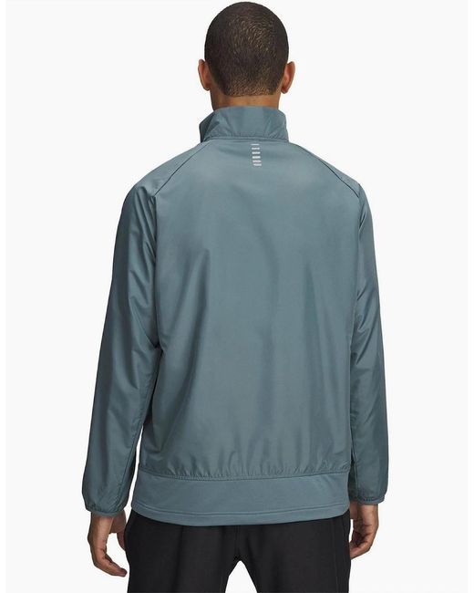 Under Armour Blue Launch Solid Patterned High Neck Training Jacket for men