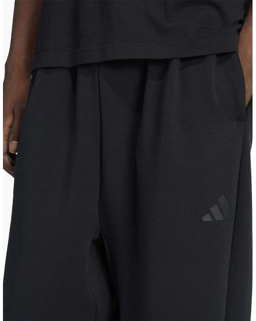 Adidas Black Solid Patterned Wide Fit Sweatpants for men
