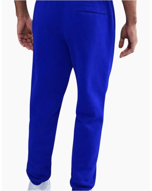 Nike Blue Club Joggers Fn3808 Cuffed Brushed Trousers for men