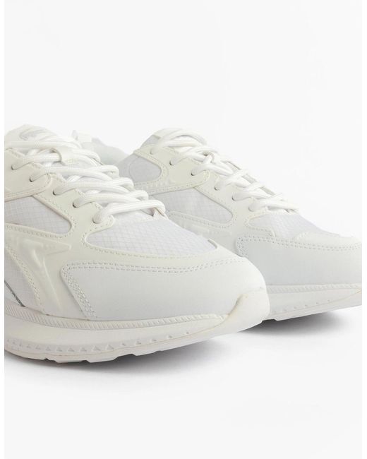 Lacoste White L003 Evo Performance Trainers Trainers for men