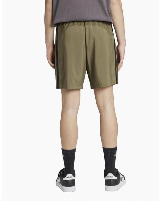 Adidas Green Essentials 3 Stripes Shorts for men