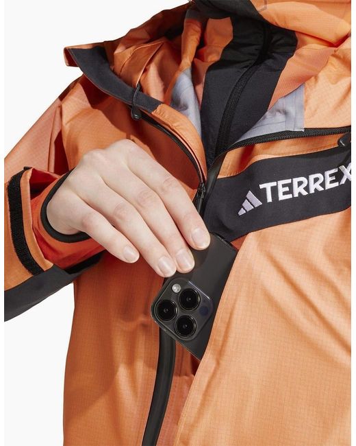 Adidas Brown Solid Patterned Hooded Full Zipper Rain Jacket