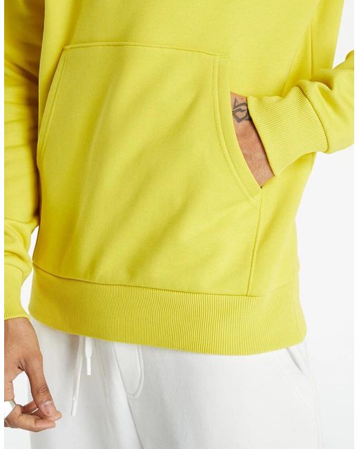 The North Face Yellow Raglan Box Hoodie for men