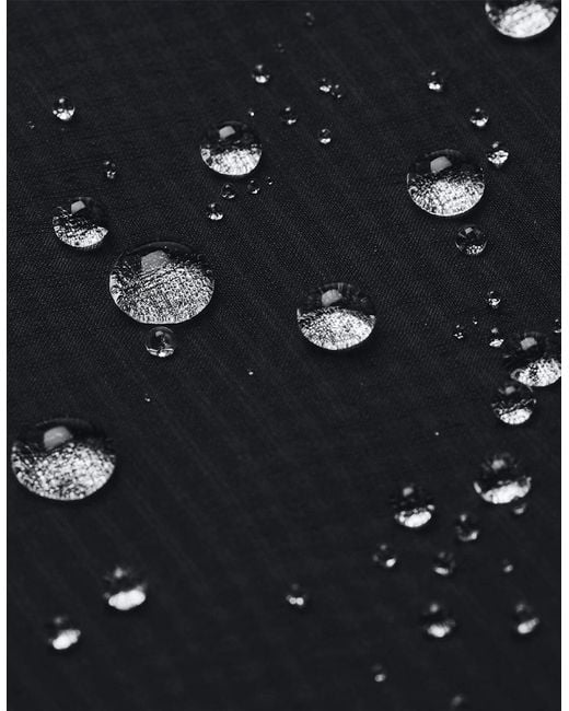 Under Armour Blue Launch Solid Patterned Hooded Running Jacket
