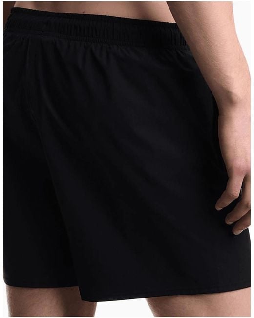 Emporio Armani Blue Nylon Embroidered Logo Swim Shorts for men