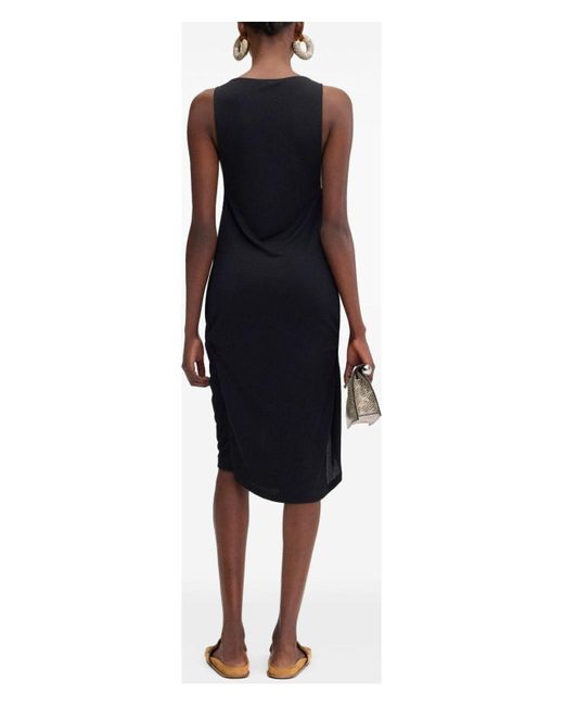 Jacquemus Black Elegant Short Peplum Dress