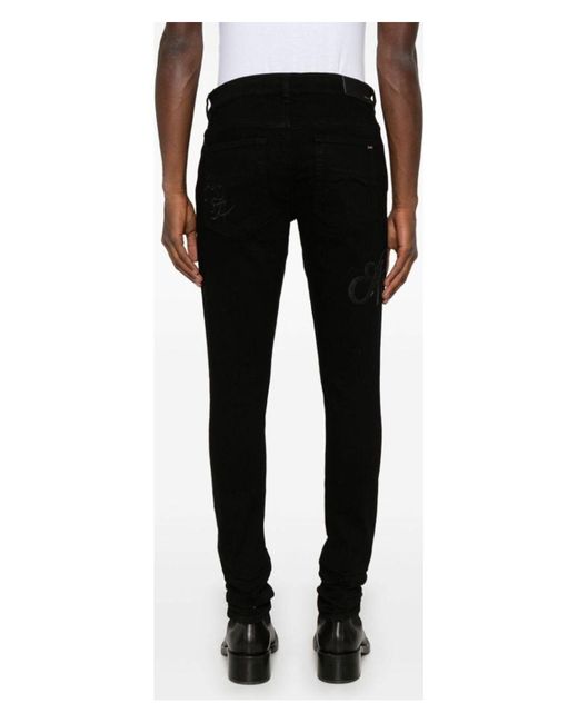 Amiri Black Script Logo Skinny Jeans for men