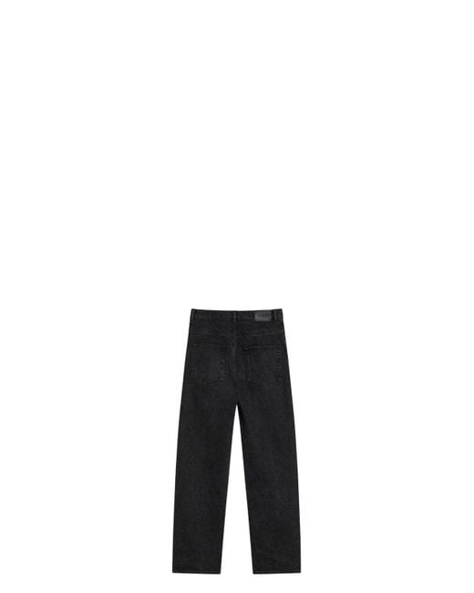 デニム・ジーパン Saint Laurent Black Carrot-Fit Jeans With A Washed Effect Saint Laurent Carrot-Fit Jeans With A Washed Effect in Black