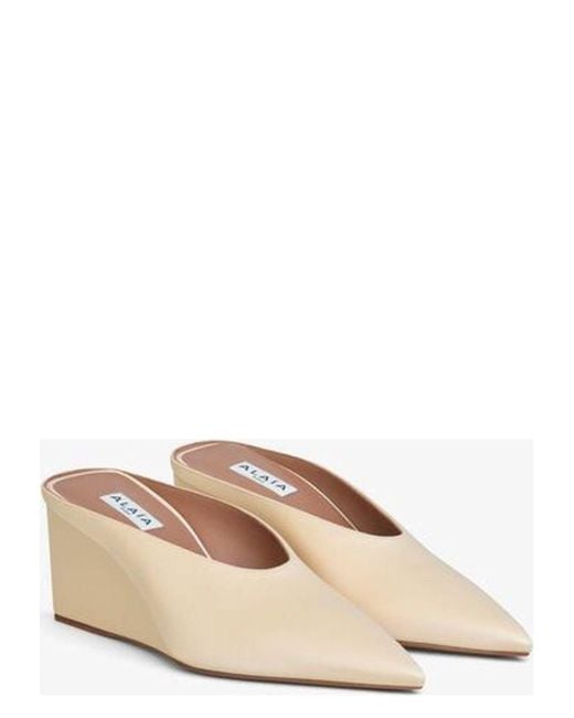 Alaïa Natural Sand Bucket Wedge Mules