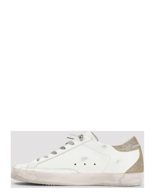 Golden Goose Deluxe Brand White Super Star Leather Upper And Star Glitter Heel And Spur Sneaker