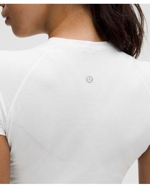 lululemon athletica White – Swiftly Tech Cropped Short-Sleeve Shirt 2.4 – – Size 4