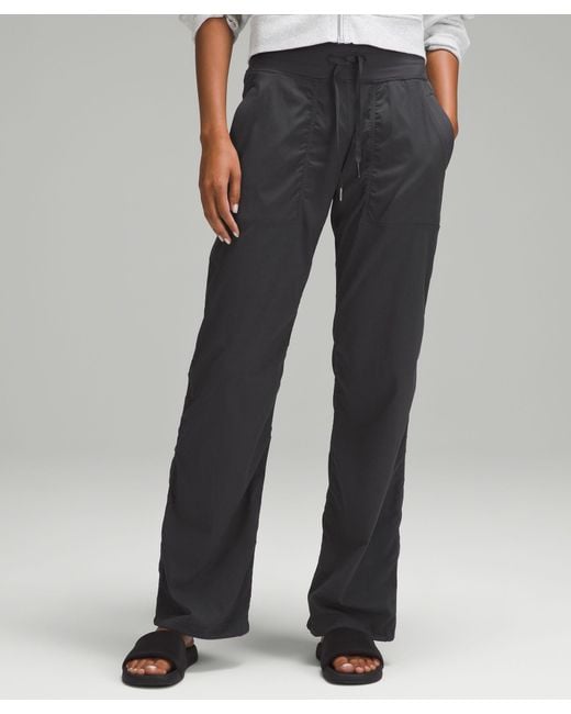 https://cdna.lystit.com/520/650/n/photos/lululemon/089c5b83/lululemon-athletica-designer-graphite-grey-Dance-Studio-Mid-rise-Pants-Regular.jpeg