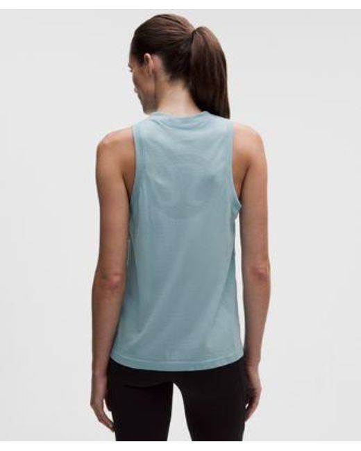 lululemon athletica Blue – Swiftly Relaxed Tank Top Hip Length Logo – – Size 6