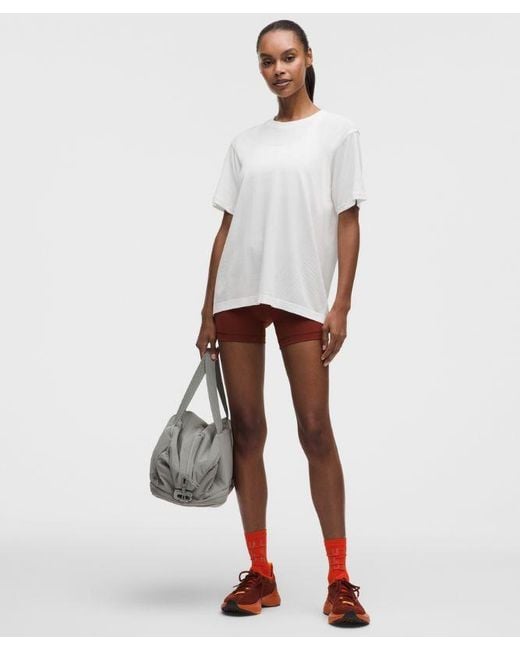 lululemon athletica White – Swiftly Relaxed Short-Sleeve Shirt Hip Length Logo – – Size 4