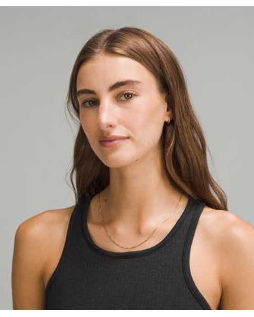lululemon athletica Ebb To Street Cropped Racerback Tank Top - Color Black - Size 10