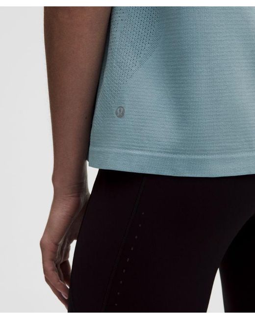 lululemon athletica Blue – Swiftly Relaxed Tank Top Hip Length Logo – – Size 6