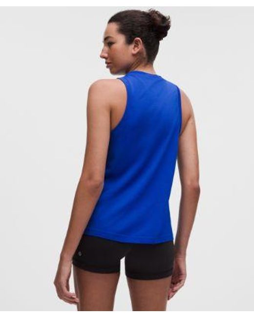 lululemon athletica Blue – Swiftly Relaxed Tank Top Hip Length Logo – – Size 4