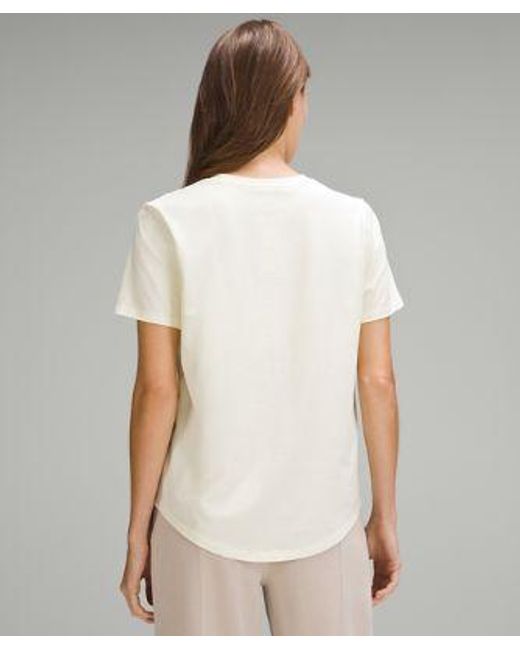 lululemon athletica White Love V-neck T-shirt - Color Yellow/pastel - Size 0