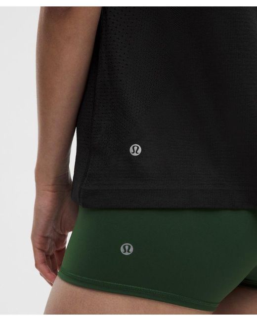 lululemon athletica Black – Swiftly Relaxed Tank Top Hip Length Logo – – Size 4