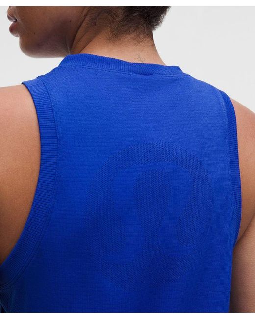 lululemon athletica Blue – Swiftly Relaxed Tank Top Hip Length Logo – – Size 4