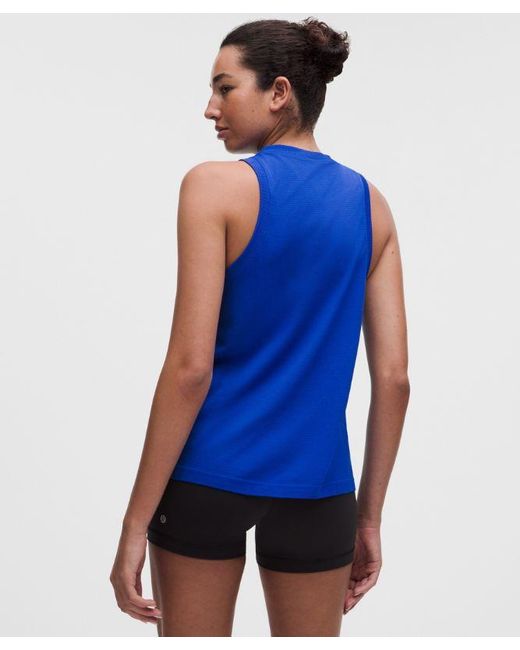 lululemon athletica Blue – Swiftly Relaxed Tank Top Hip Length Logo – – Size 4